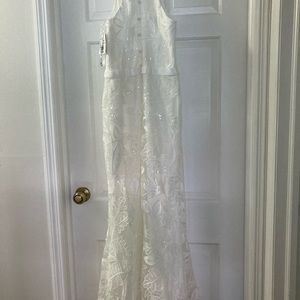 Beautiful new with tags wedding dress